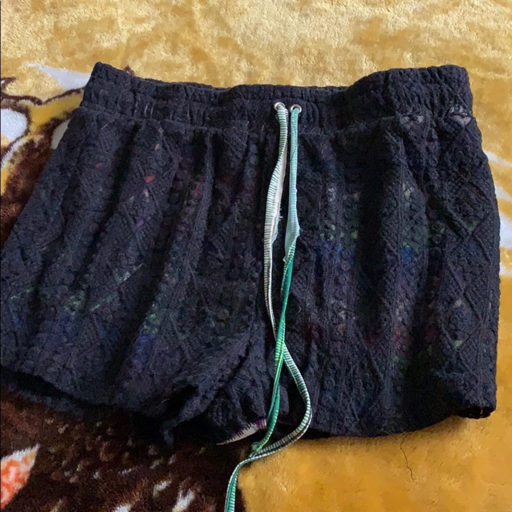 Black shorts.